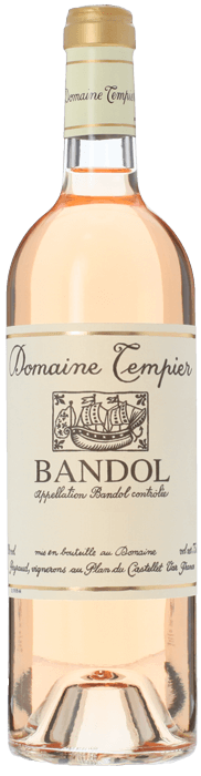 Bottle of Domaine Tempier Bandol rosé showing its pale salmon color, representing Provence’s iconic structured rosé style.